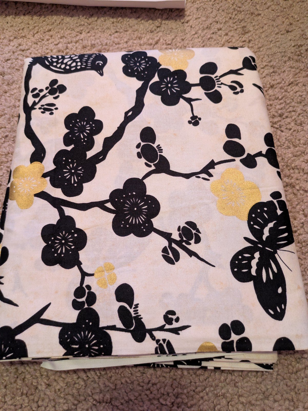 Box of Asian themed fabric