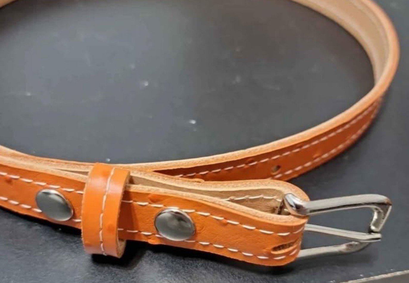 Women's dress belt 32 inches in length in orange