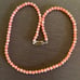 Orange pink angel skin coral necklace