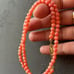 Orange pink angel skin coral necklace