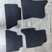 First and second row carpeted floor mats jet black