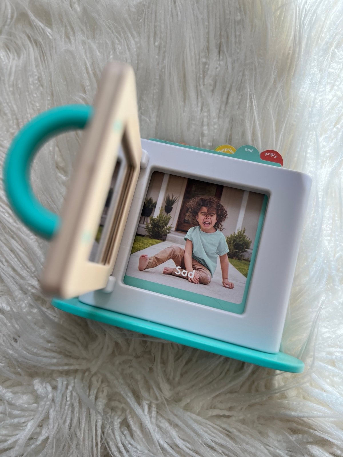 Lovevery emotions take a peek toy