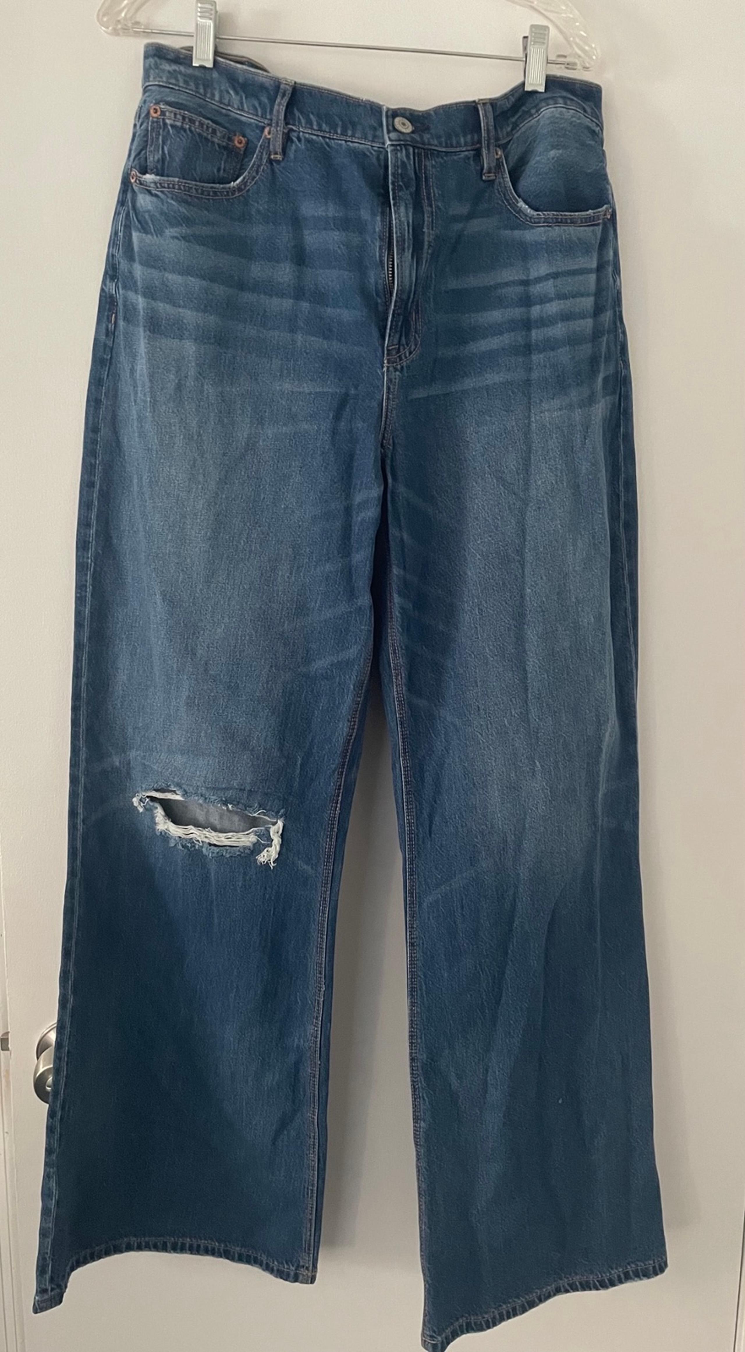 Distressed American Eagle 16 L stretch low rise flare jeans