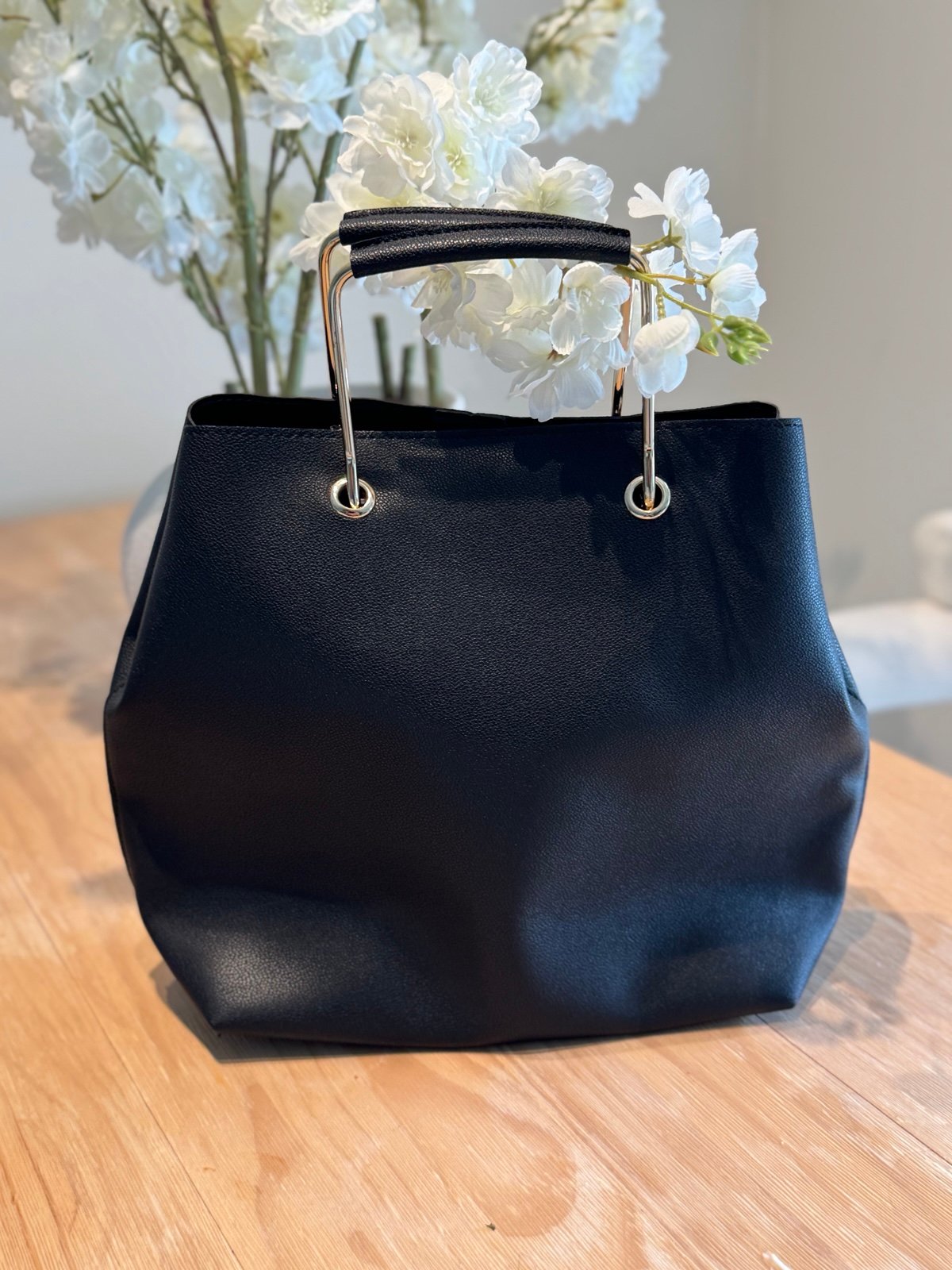 Black tore bag gold handles