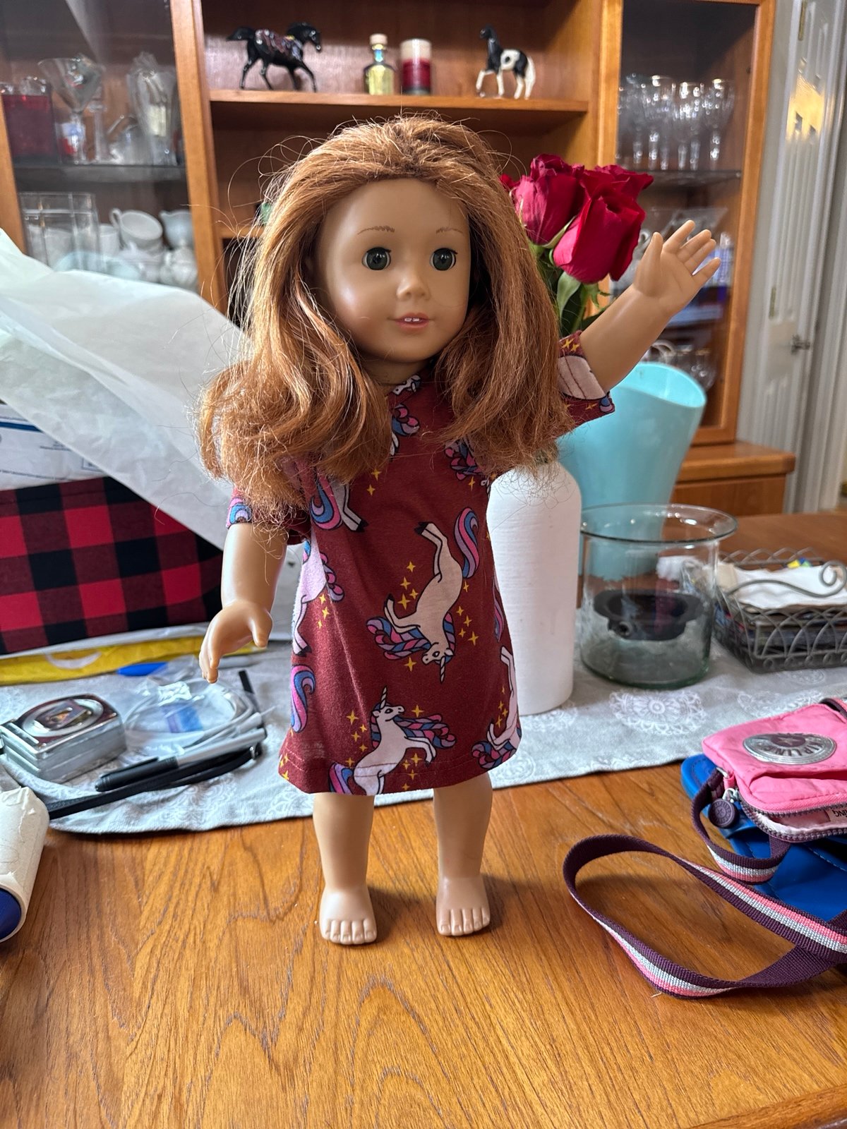American girl doll red hair hazel eyes her hair is not perfect.