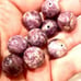 Lot of 14mm lepidolite beads. 109