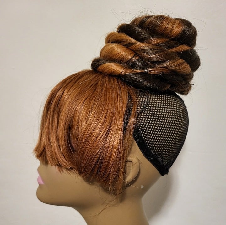 Custom Wigs T. Taylor Loose Twist Bun