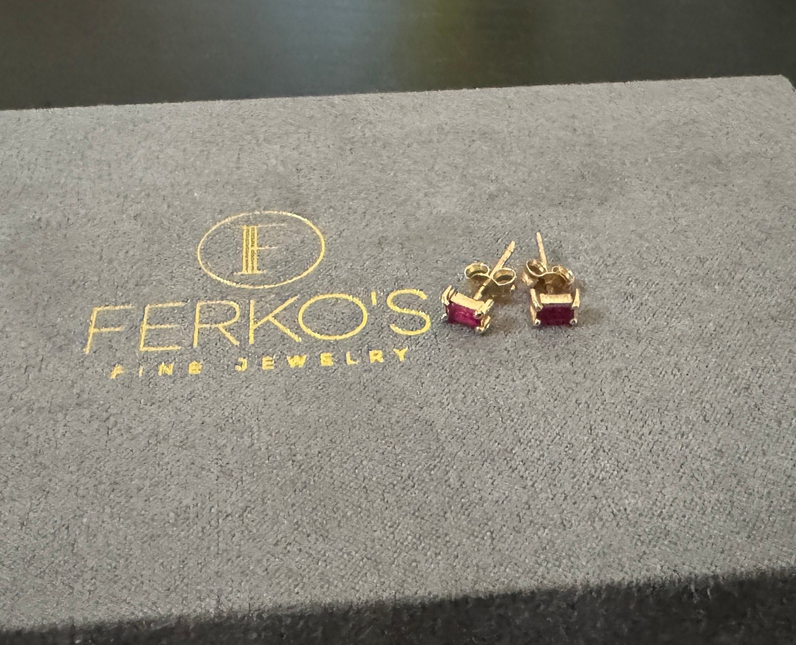 Ferko’s 14k gold baquette ruby earrings