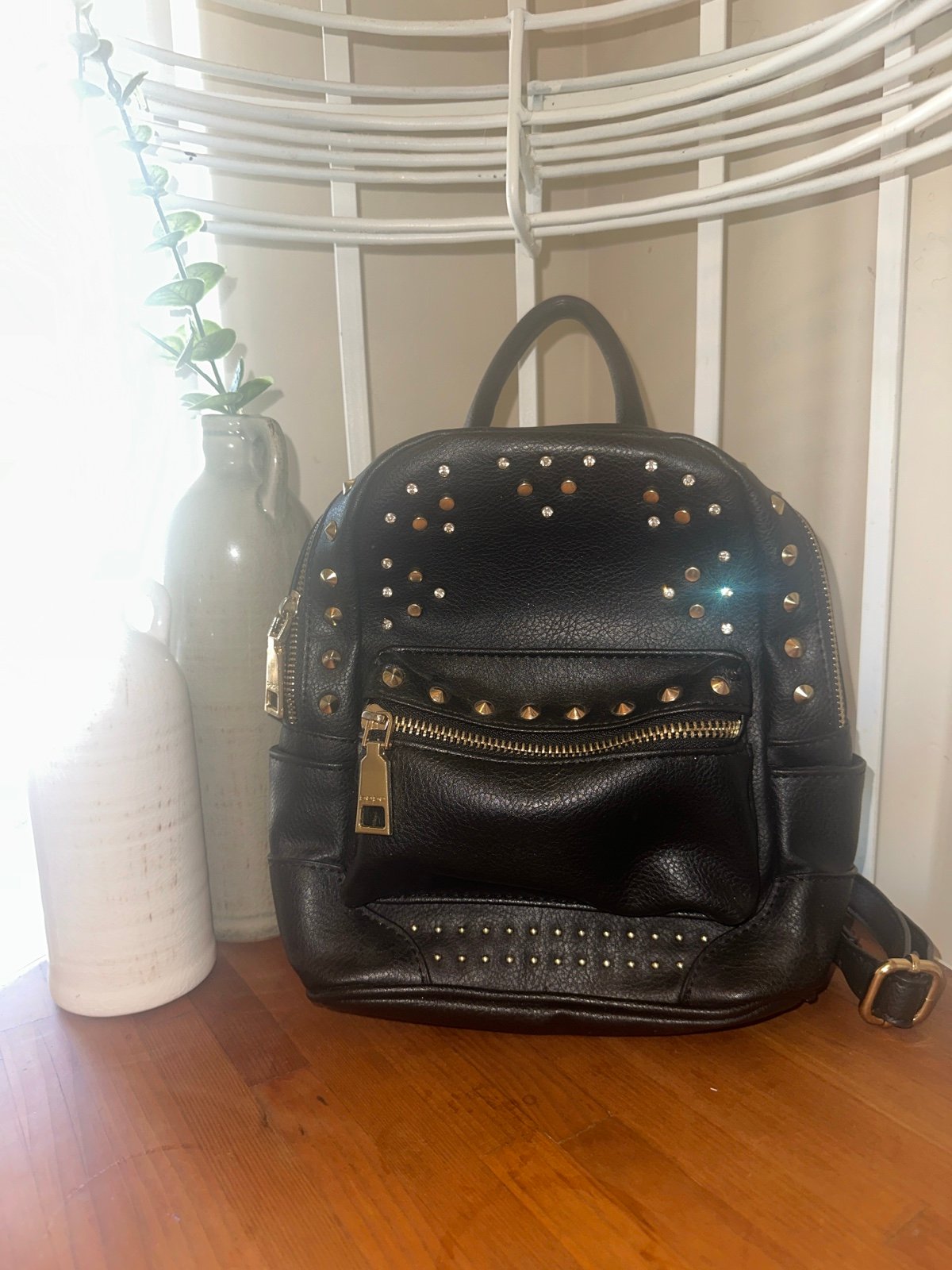 BEBE leather backpack with gold studs and rhinestones