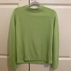 green sweater