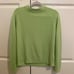 green sweater