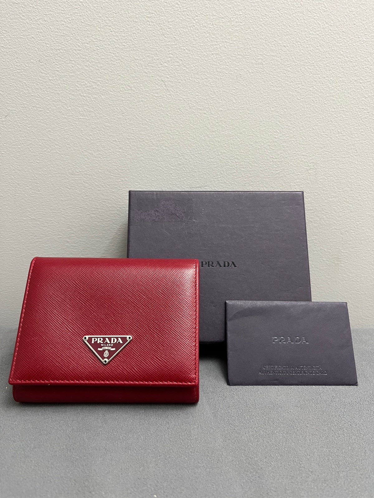 PRADA Saffiano Leather Rubino Trifold Wallet