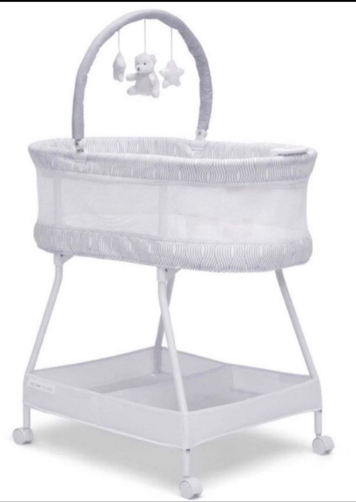 Delta Children Curve Bassinet, White/Grey  Open box item INVENTORY NUMBER: 102