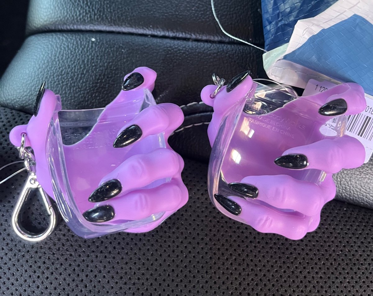 Witch hand pocketbac holders