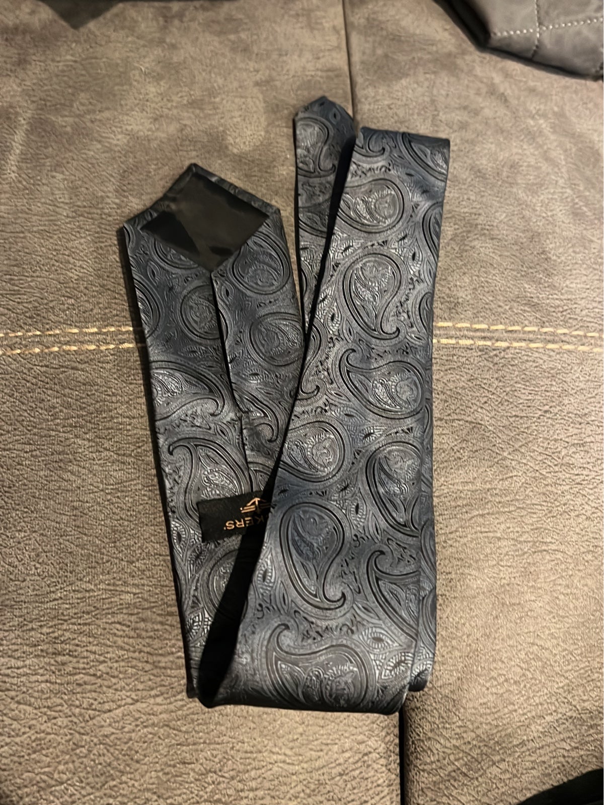 Men’s Dockers neck tie dark grey with designs.