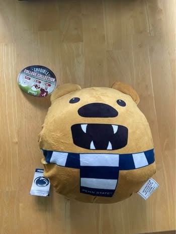 New With Tags, Penn State Snugible that can be used as a pillow or to wear.