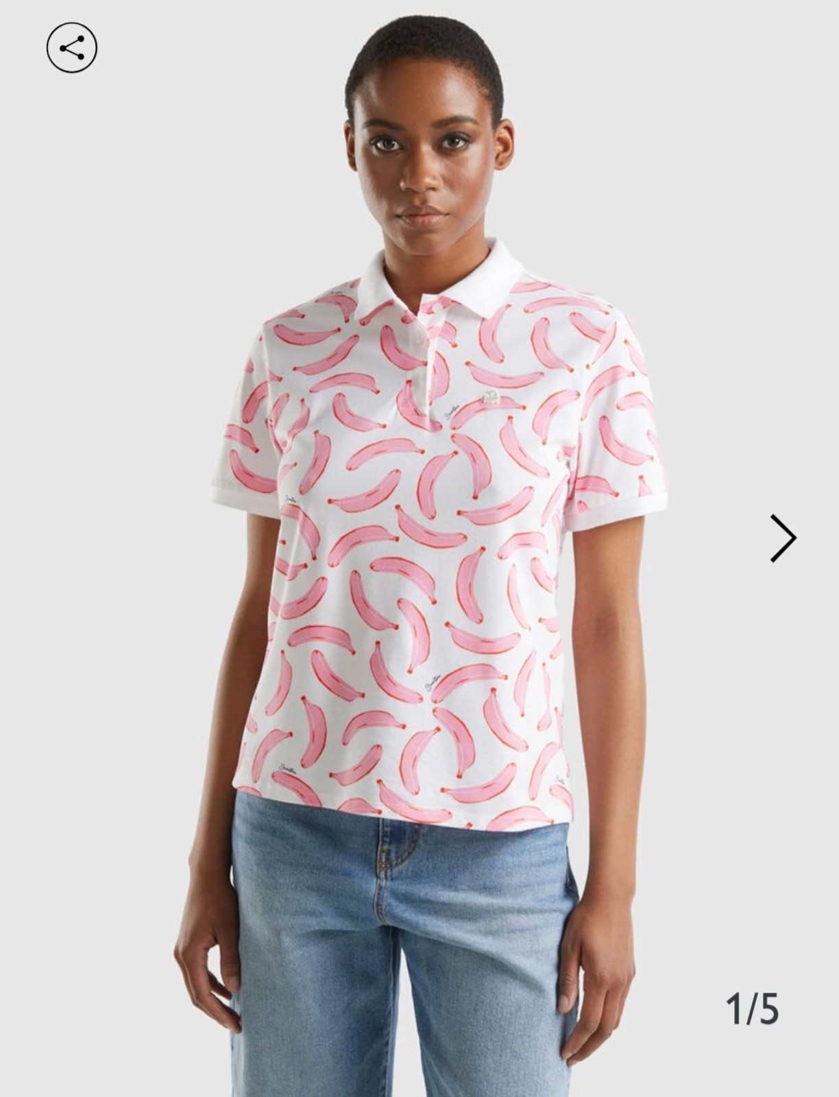 Benetton White polo with banana pattern