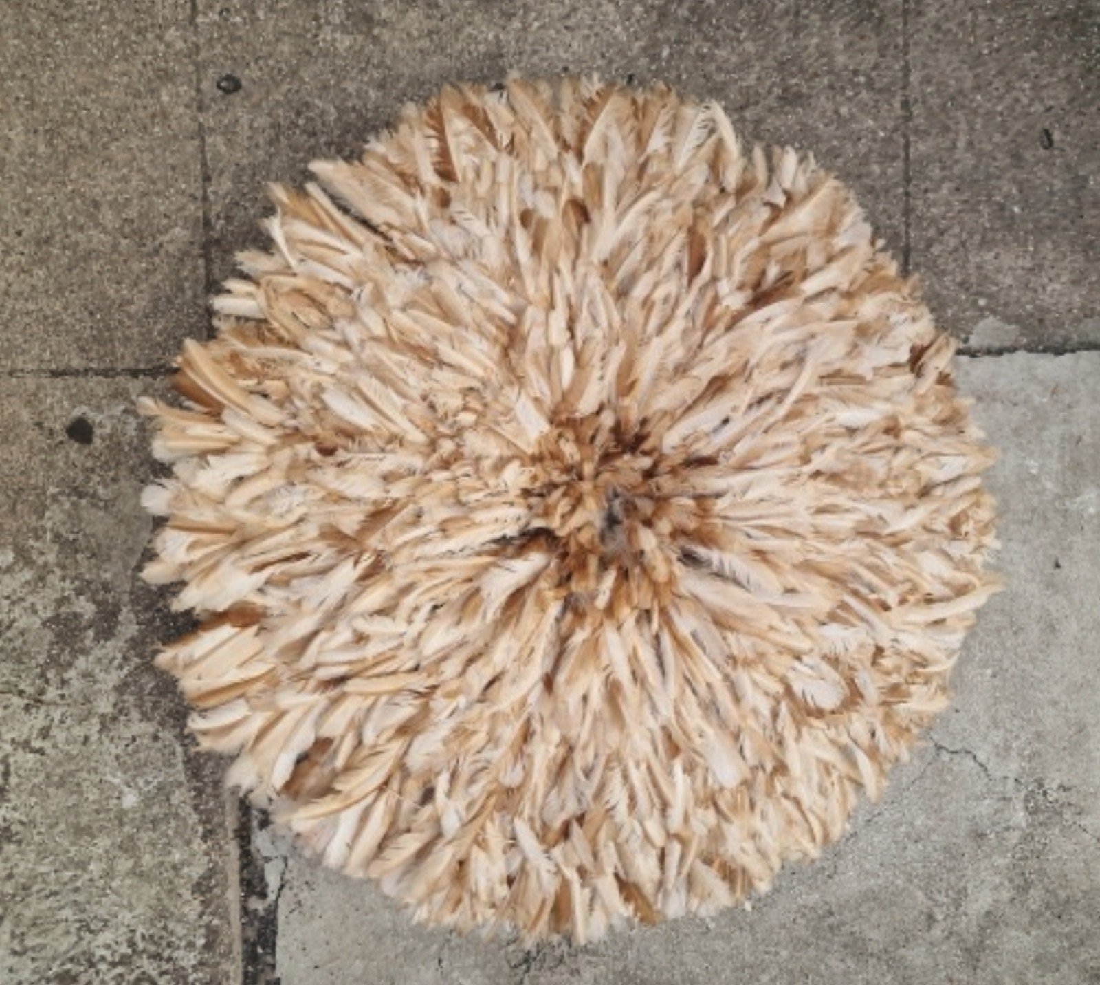 Cameroon chicken feather called juju hat. The dimension 21 inches