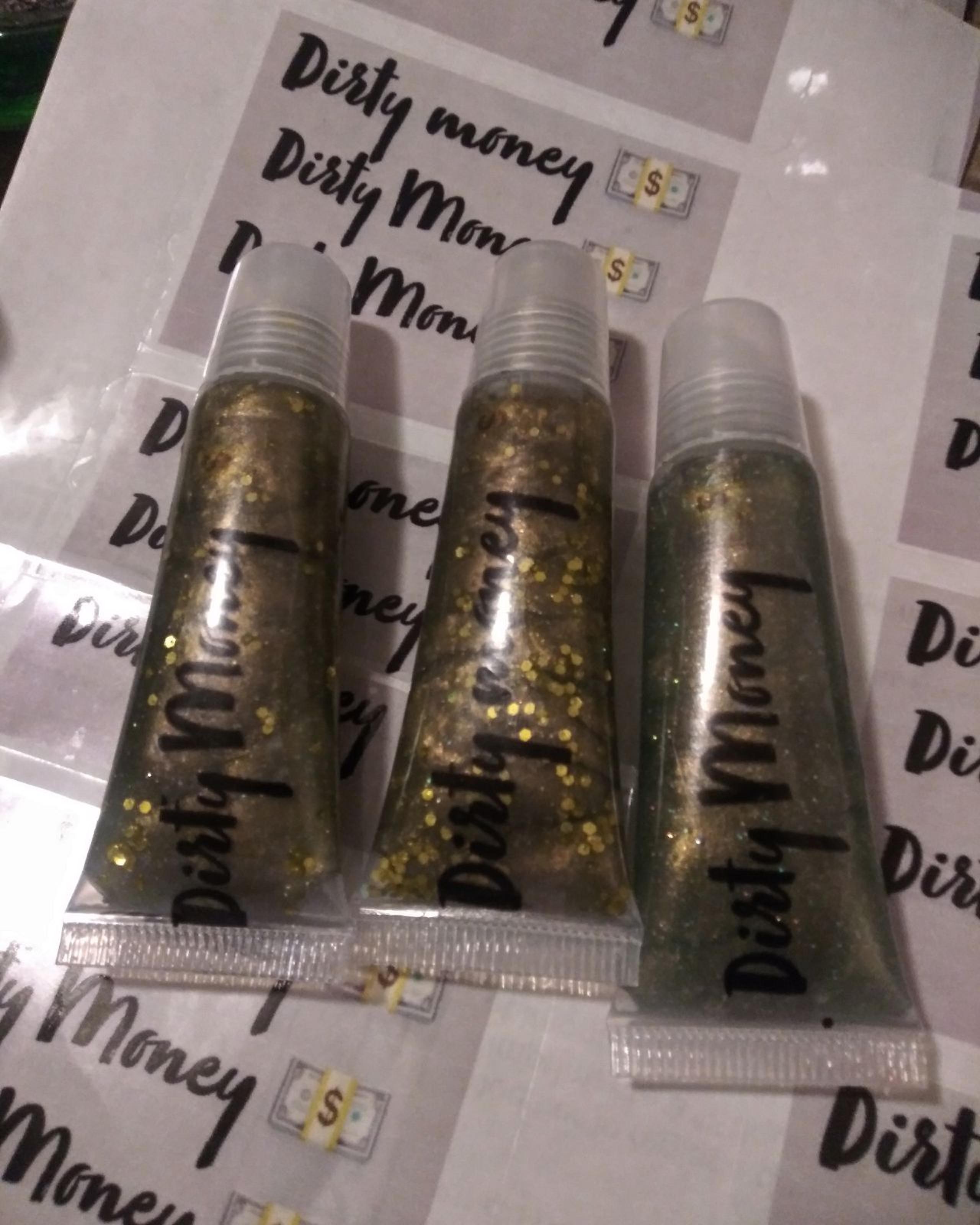 Dirty Money custom made lip gloss
