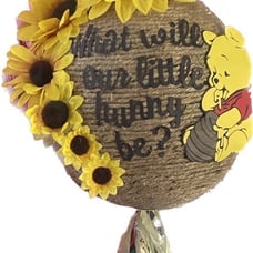 Gender reveal party beehive balloon Winnie the Pooh themed with pull tassel
