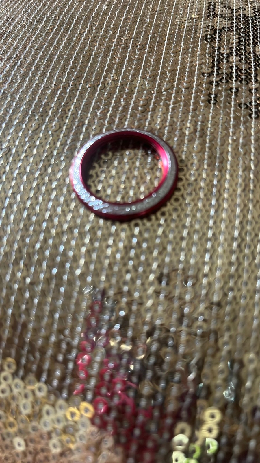 Red bezel with sparkle like diamonds.