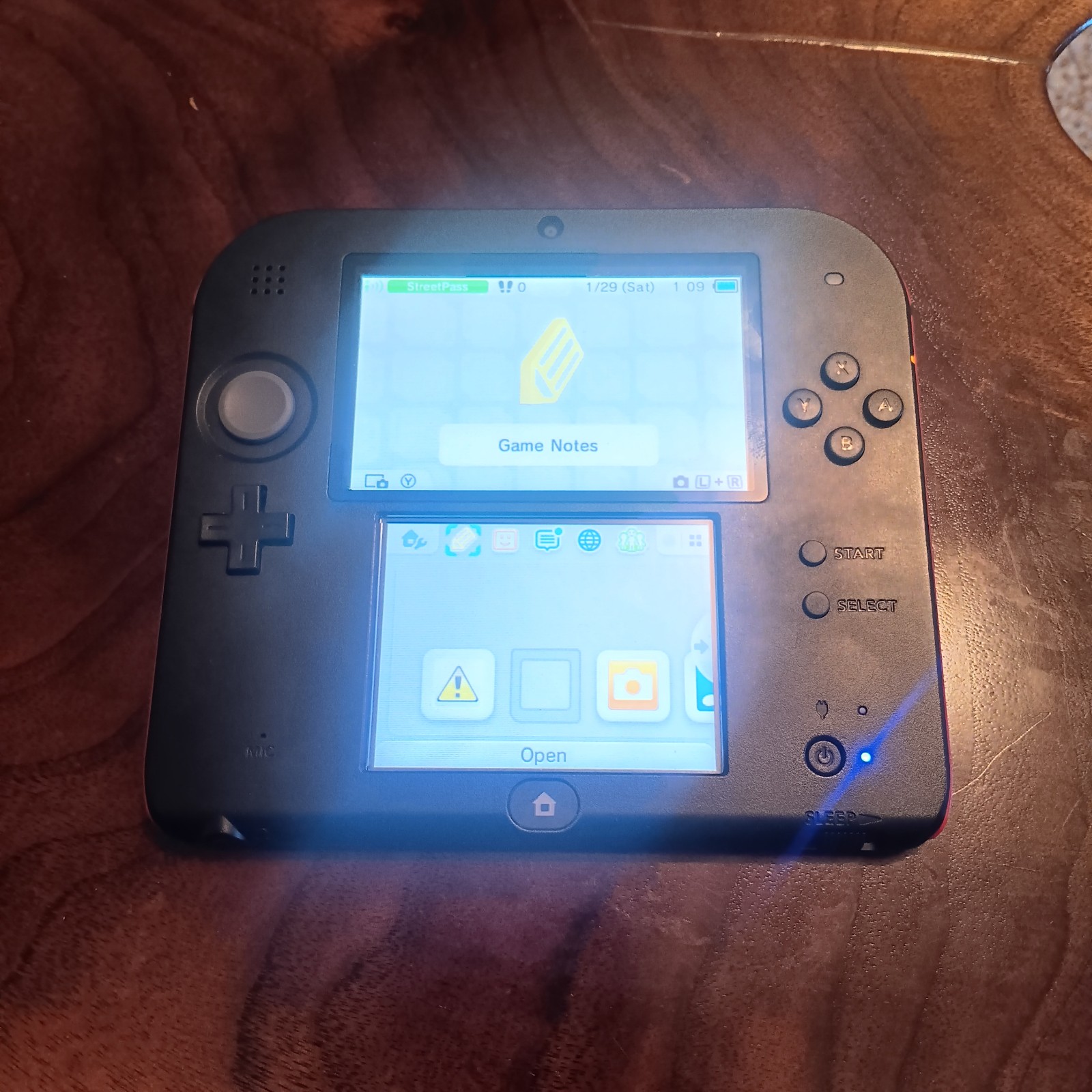 Nintendo 2DS console, black and red