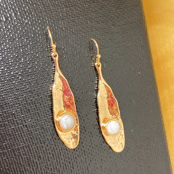 Golden teardrop with white stone dangle earrings