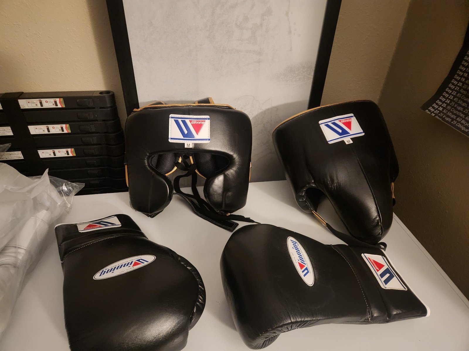 14 oz Black Winning gloves with laces plus head gear medium .