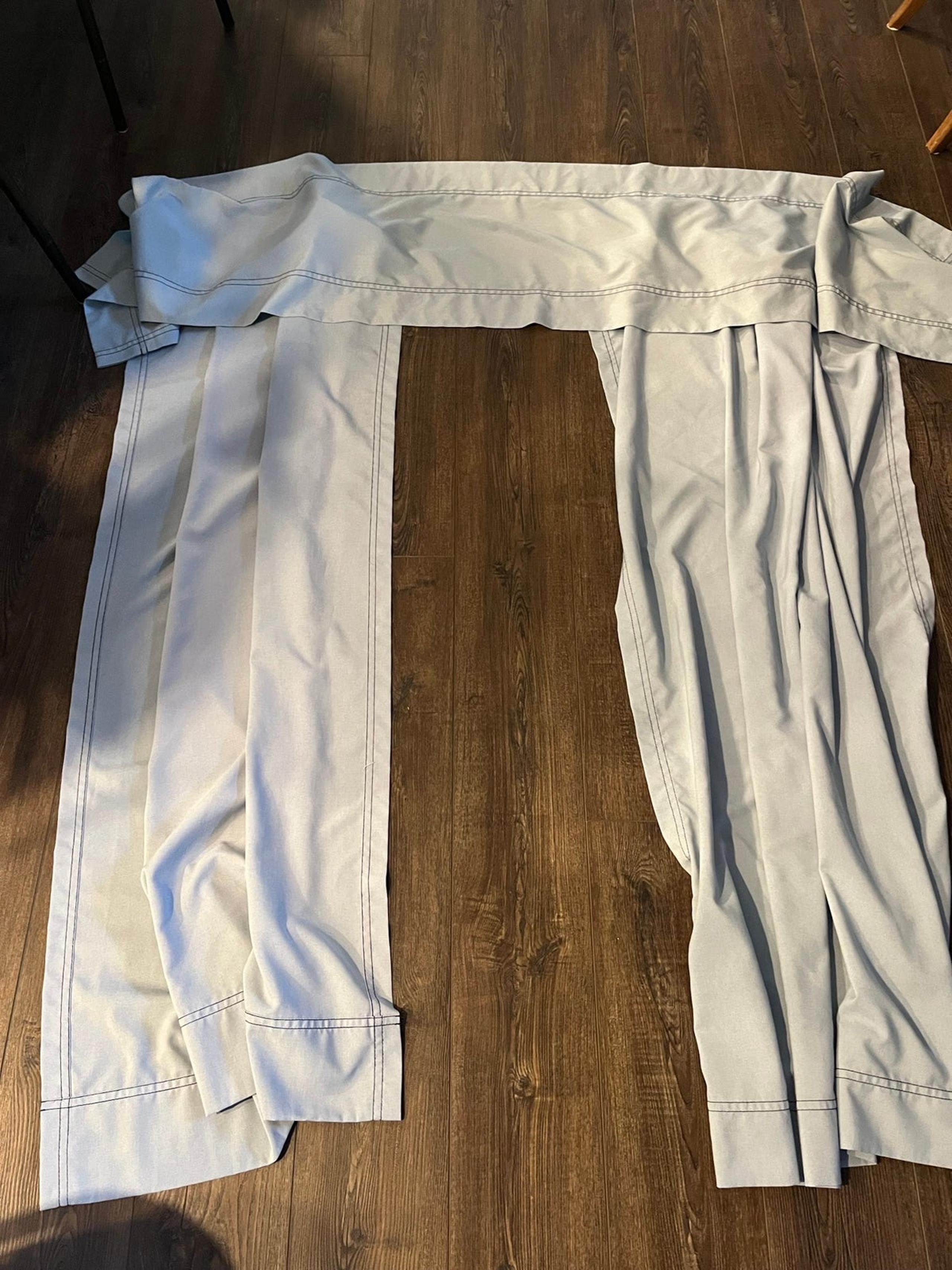 Blue curtains and valences for 4 windows