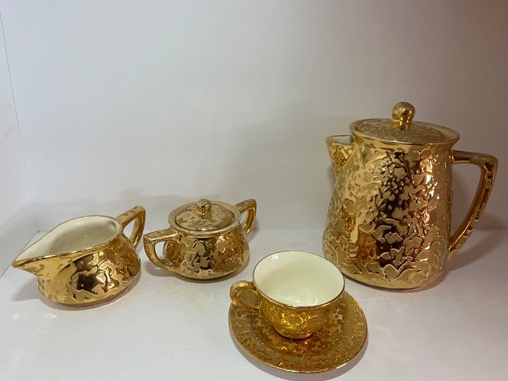 1957 MCCOY TEA/ COFFEE POT WITH CREAMER/SUGAR AND 1 CUP/SAUCER, 24K GOLD GILDED