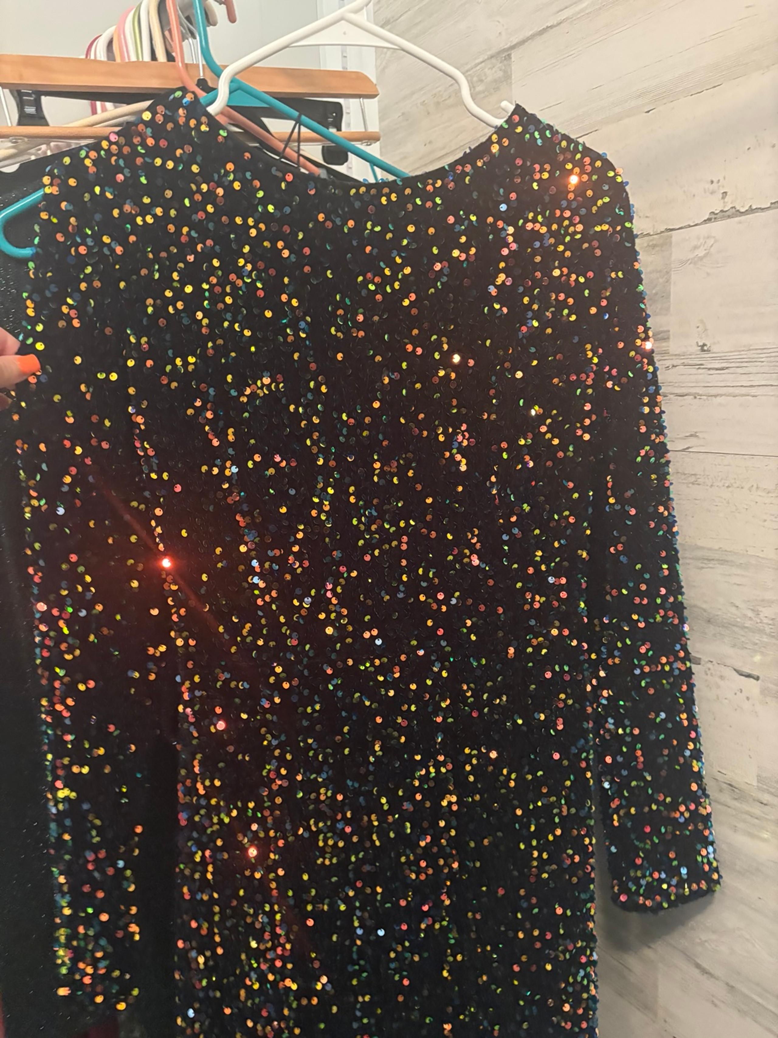 black sparkling dress, open back