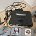 Nintendo 64 console, Zelda game, and numerous accessories - all in one lot!