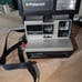 Polaroid Sun 600 LMS Camera With A Strap. Still Has Film In It, But Its Old, The