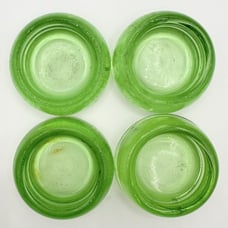Vintage Lot of Four Hazel Atlas Green Uranium Glass Furniture Coasters Slides