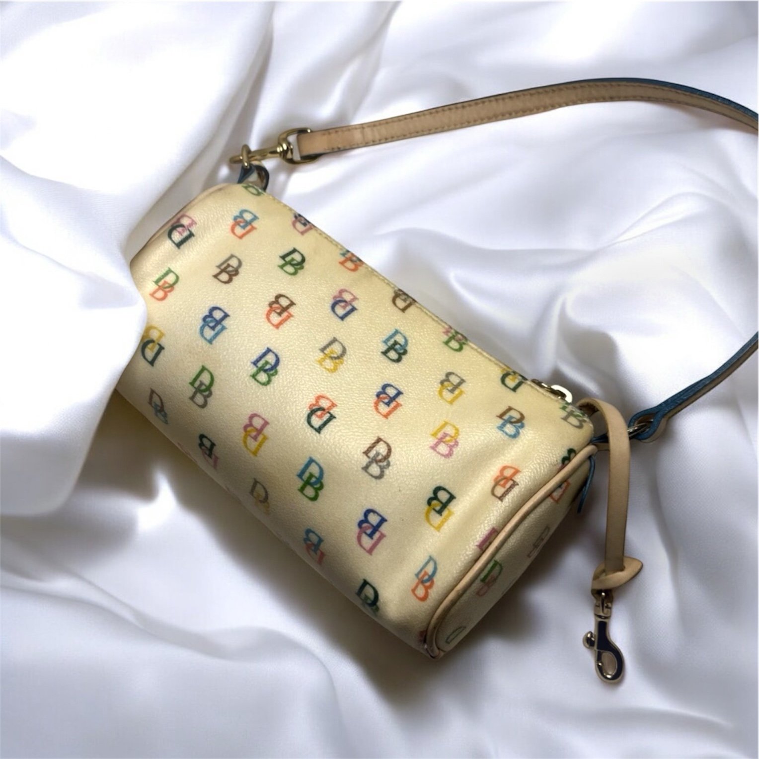 Vintage Dooney and Bourke original cream rainbow monogram tube shoulder bag