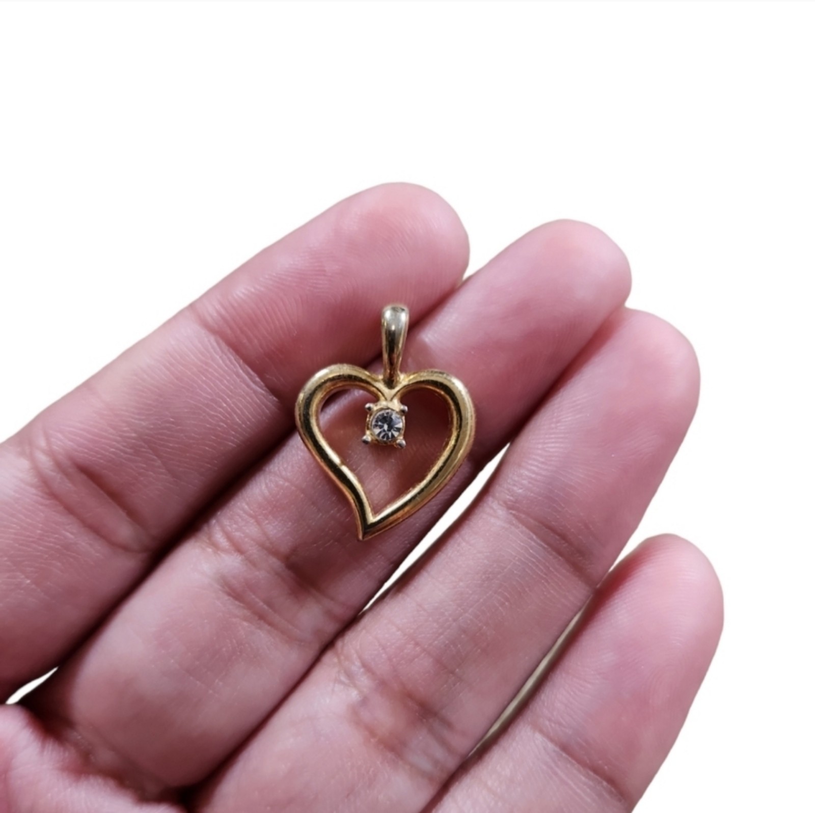 Gold Toned Cubic Zirconia Curved Heart Pendant .75