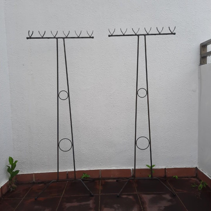 Bamboo pole stand outdoor laundry drying clothes old