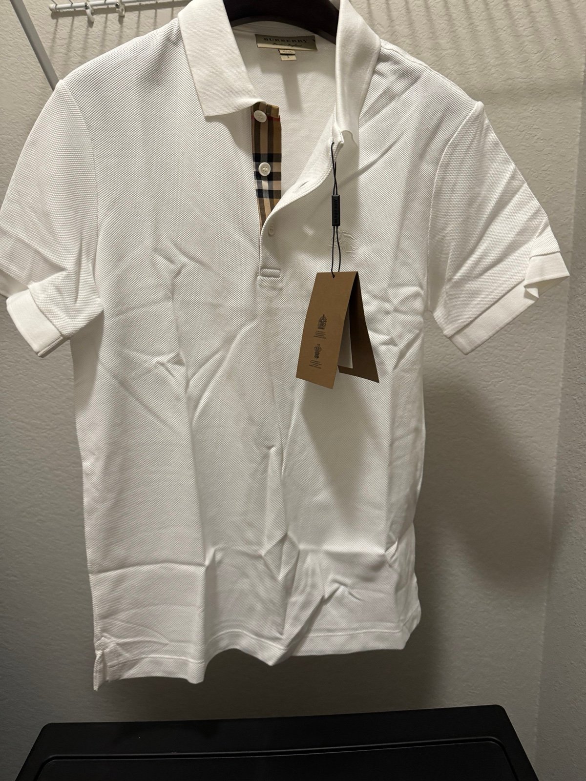 New with tags Burberry white check polo (size: small)
