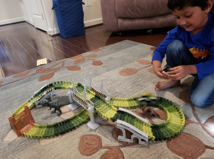 Dinosaur Toys Create A Dino World with Flexible Race Track