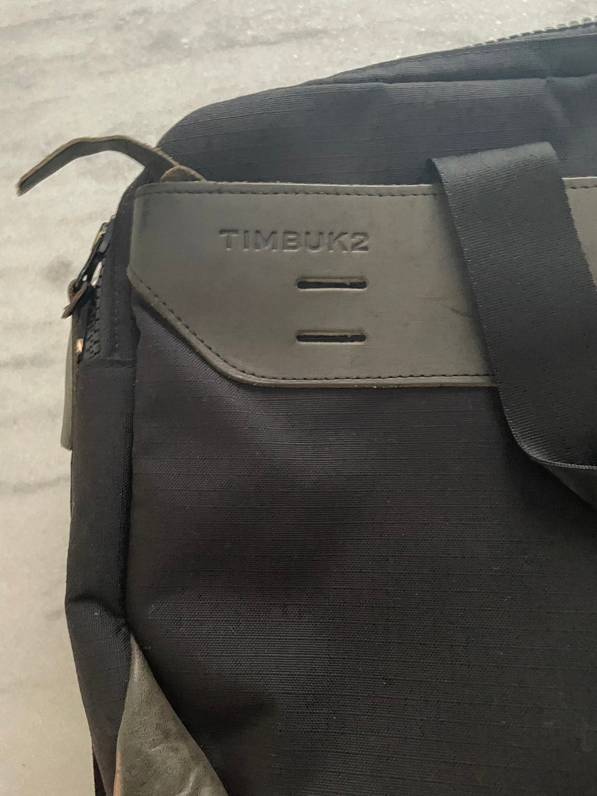 Timbuk2 leather and canvas bag