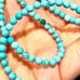 4 mm turquoise strand of beads. 405