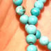 4 mm turquoise strand of beads. 405