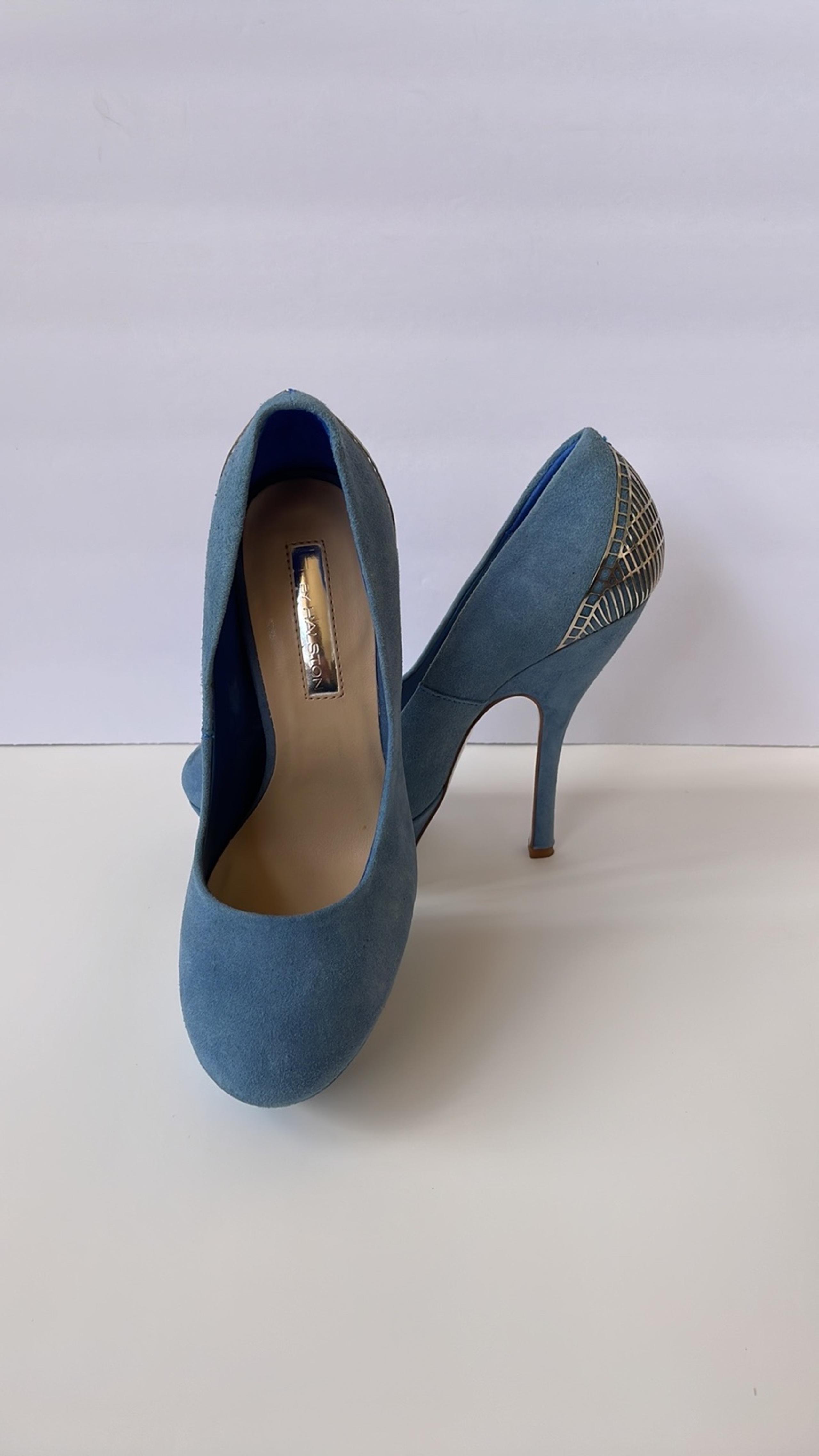 H BY HALSTON. Light blue stiletto heels with silver cage design in women’s sz 6
