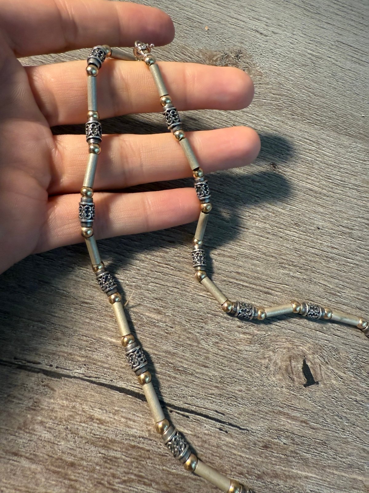 Sterling silver stamped w gold scrolled tube necklace