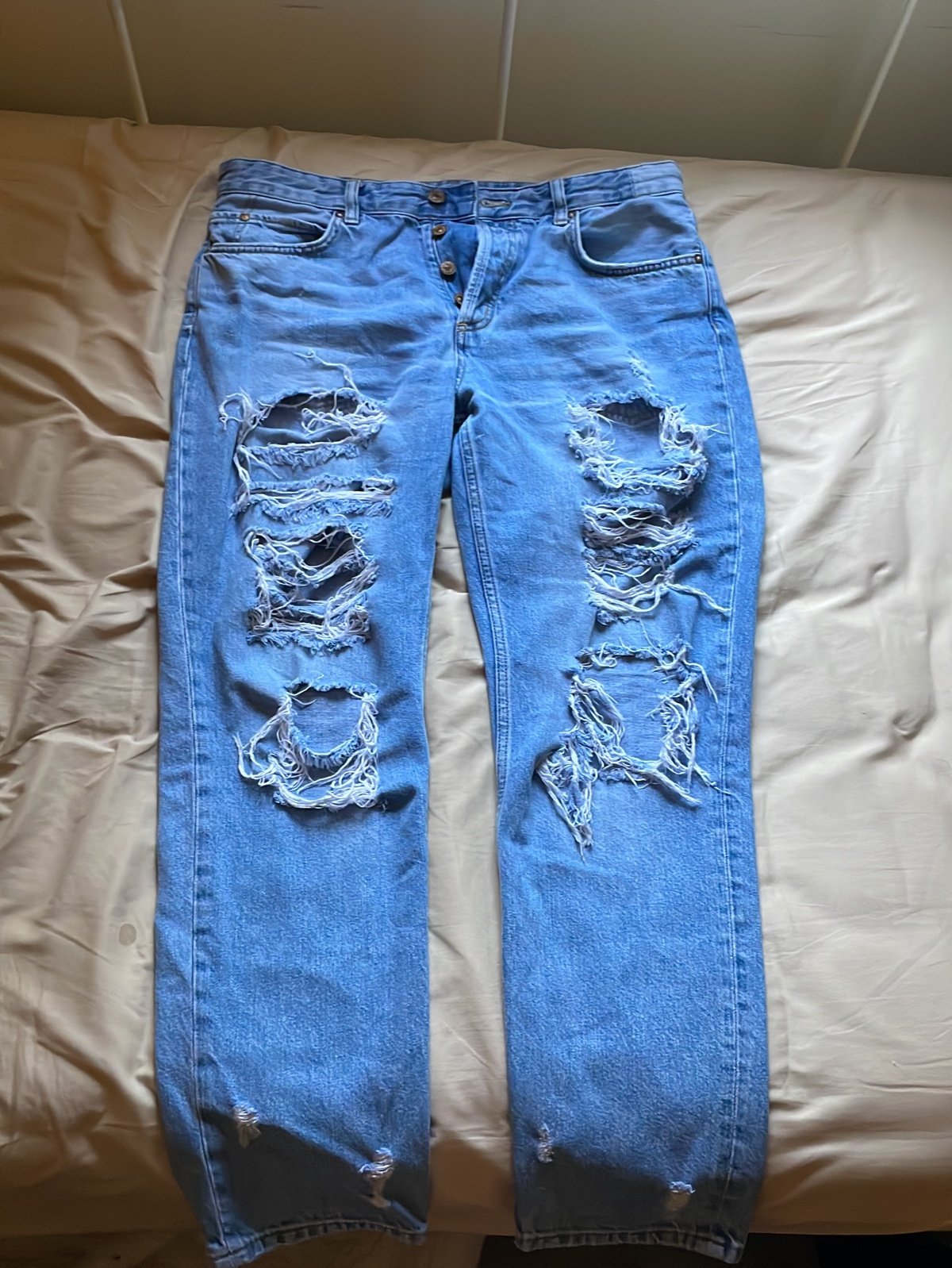 & denim ripped boyfriend jeans