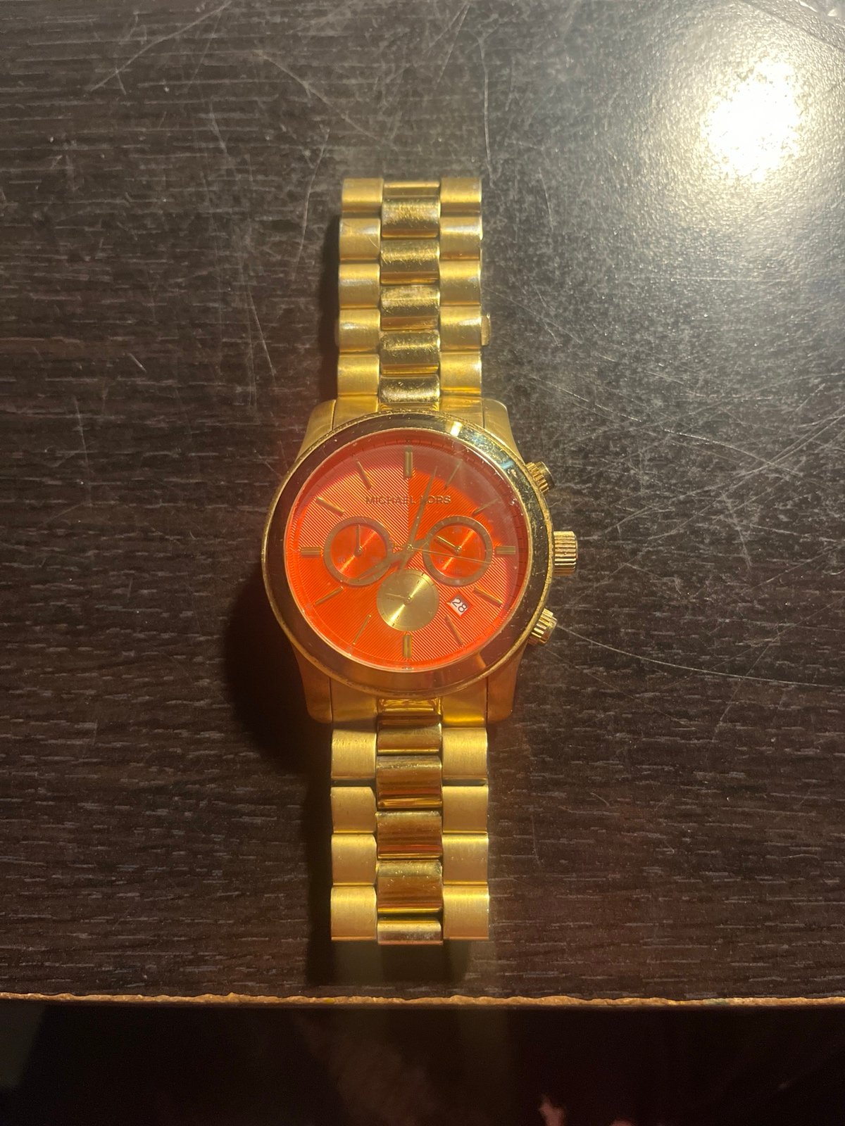 michael kors watch with red face
