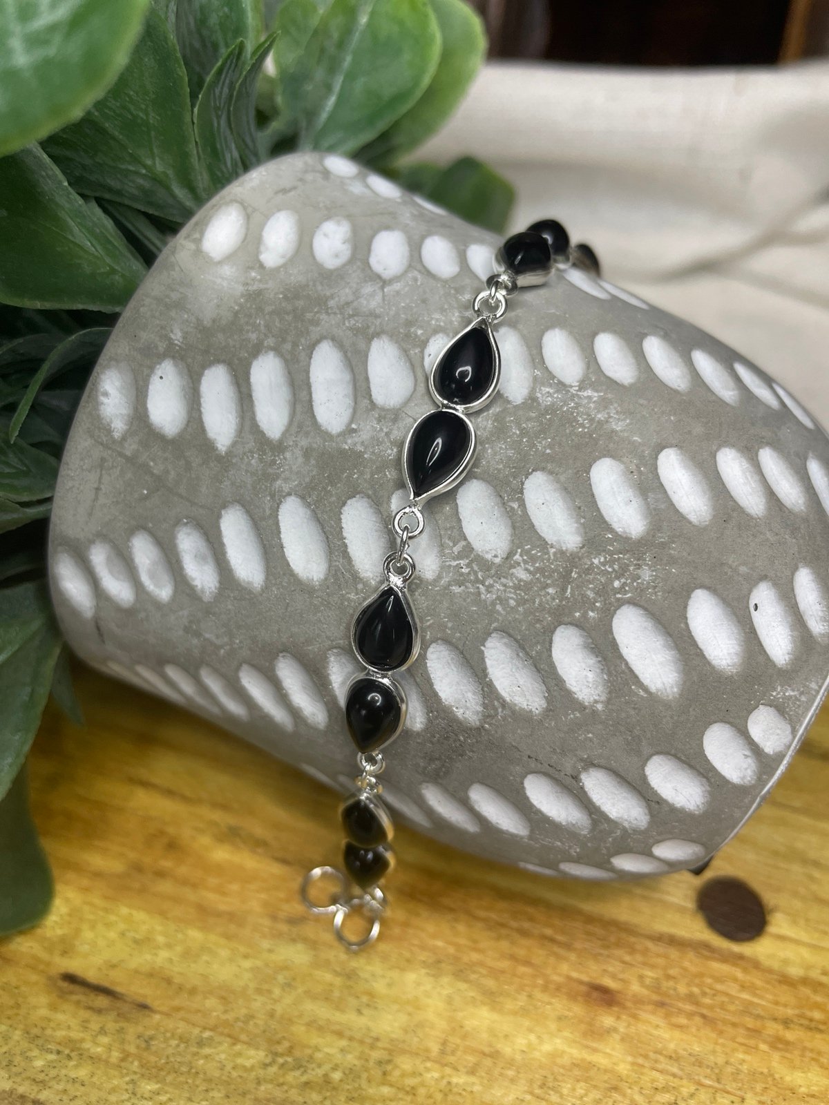 Black onyx sterling silver dew drop bracelet