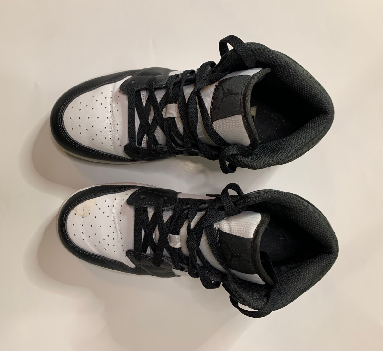Black and white women jordan 1 mid