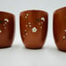 Yizing zisha zhu terracota plum floral tea cups set Signed 4 Pieces