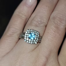 Blue and white topaz ring